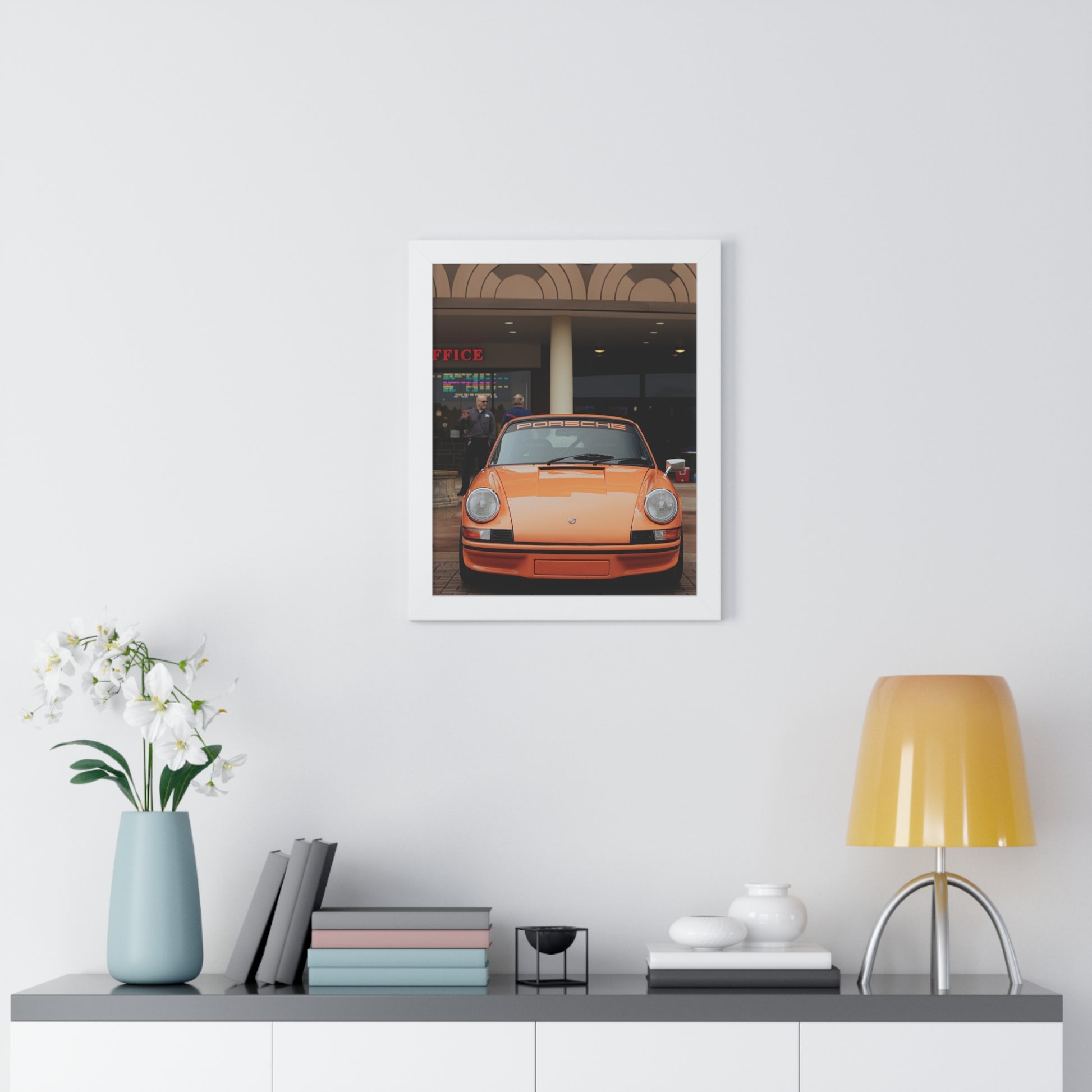 Vertical framed car poster featuring orange Porsche 