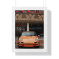 Framed poster of orange Porsche for garage wall 