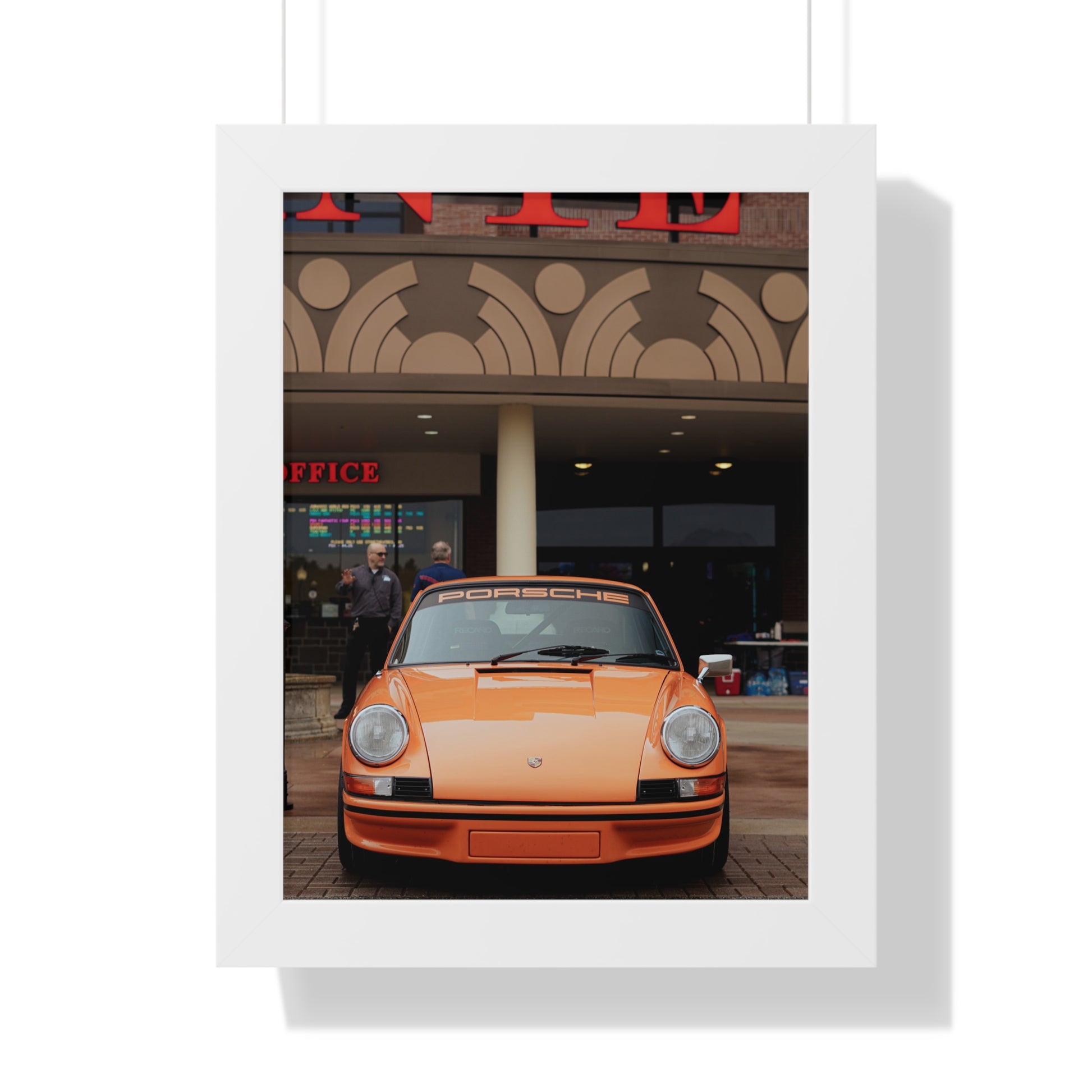 Framed poster of orange Porsche for garage wall 